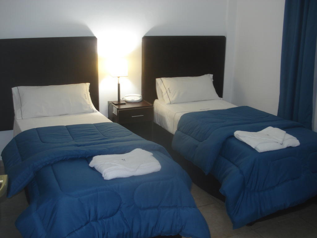 Morada Suites Campana Zimmer foto