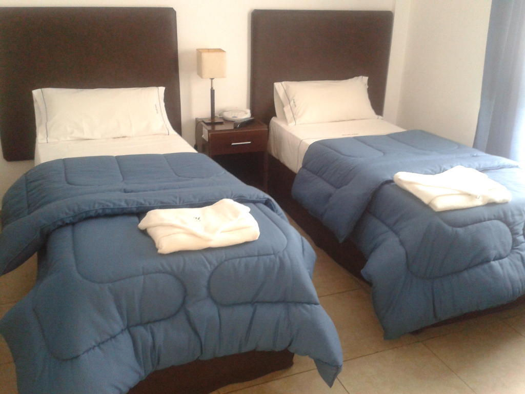 Morada Suites Campana Zimmer foto