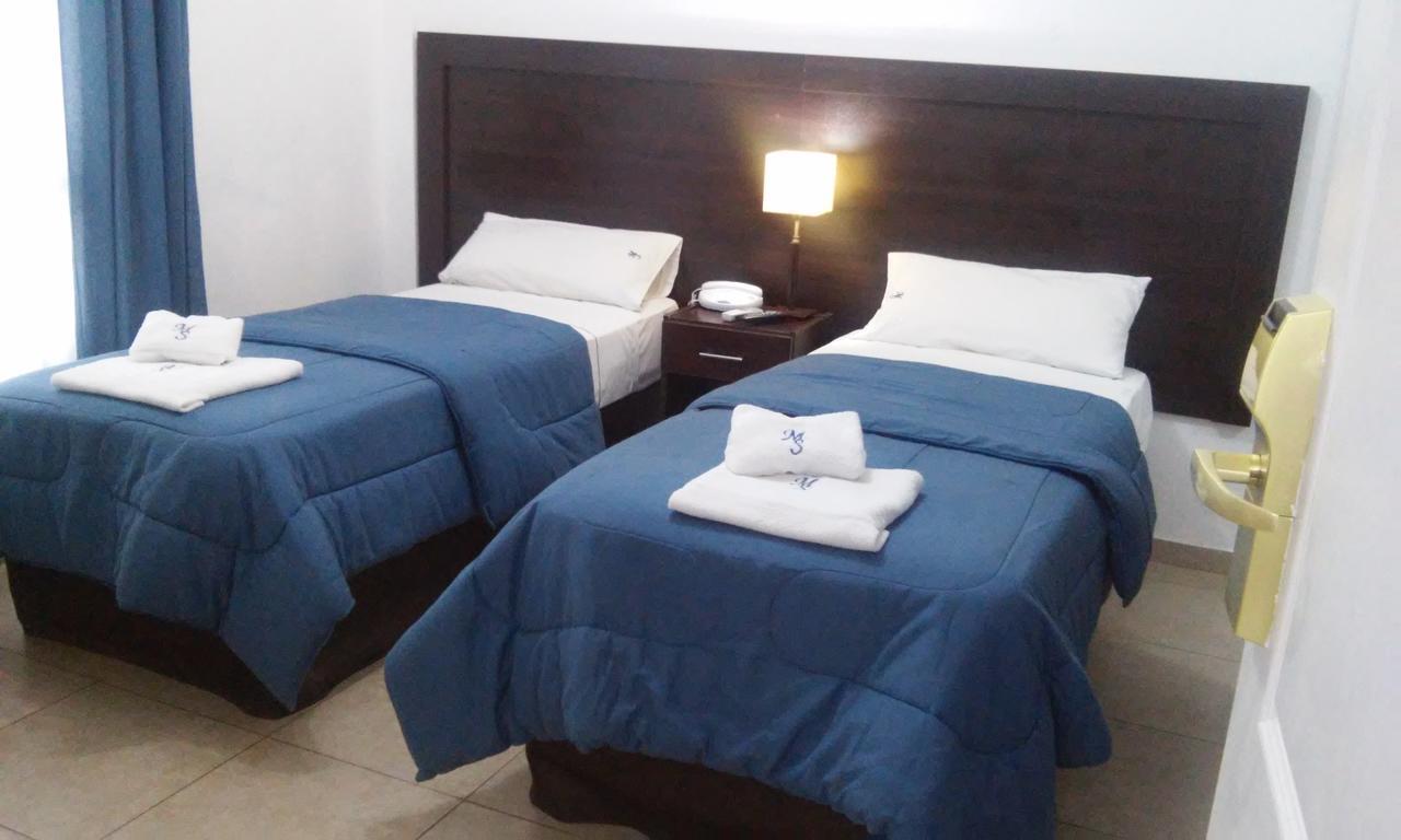 Morada Suites Campana Exterior foto